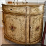 F36. Painted demilune cabinet. 34”h x 39”w x 18”d 
